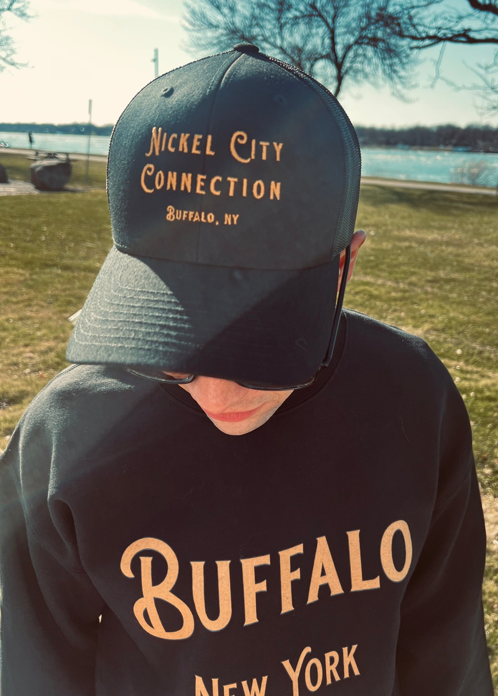 Man wearing nickel city connection hat