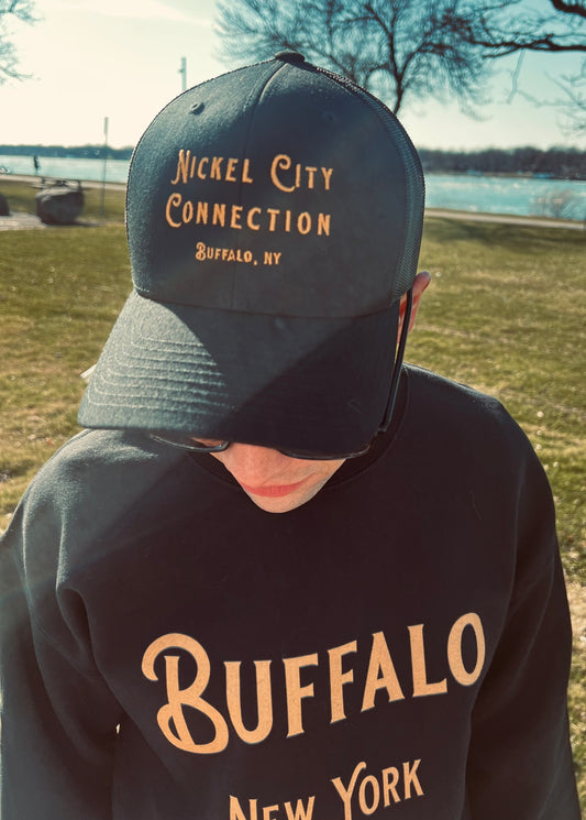 Man wearing nickel city connection hat
