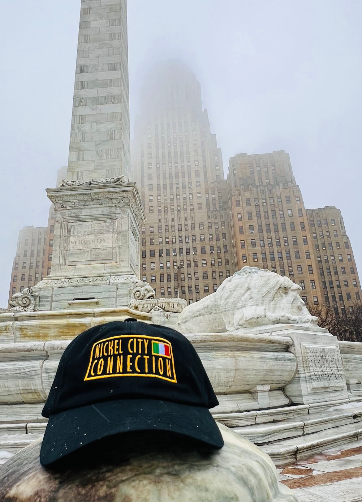 Nickel City Connection hat in front of Buffalo City Hall