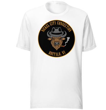 White t-shirt with a Logo featuring a stylized bison head wearing a fedora, smoking a cigar with visible smoke. The circular design includes bold gold text reading 'Nickel City Connection' at the top and 'Buffalo, NY' at the bottom, outlined in gold against a black background.