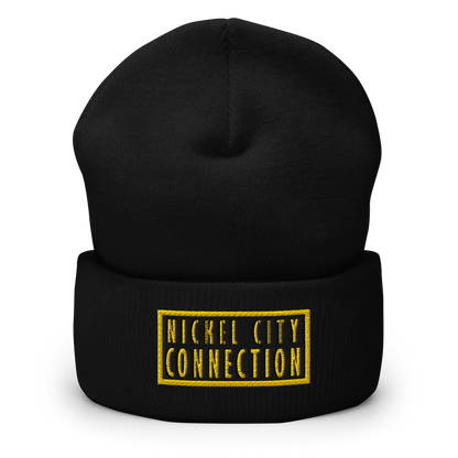 Black beanie featuring  a bold "Nickel City Connection" logo in gold and black, featuring a strong, clean design within a rectangular border.