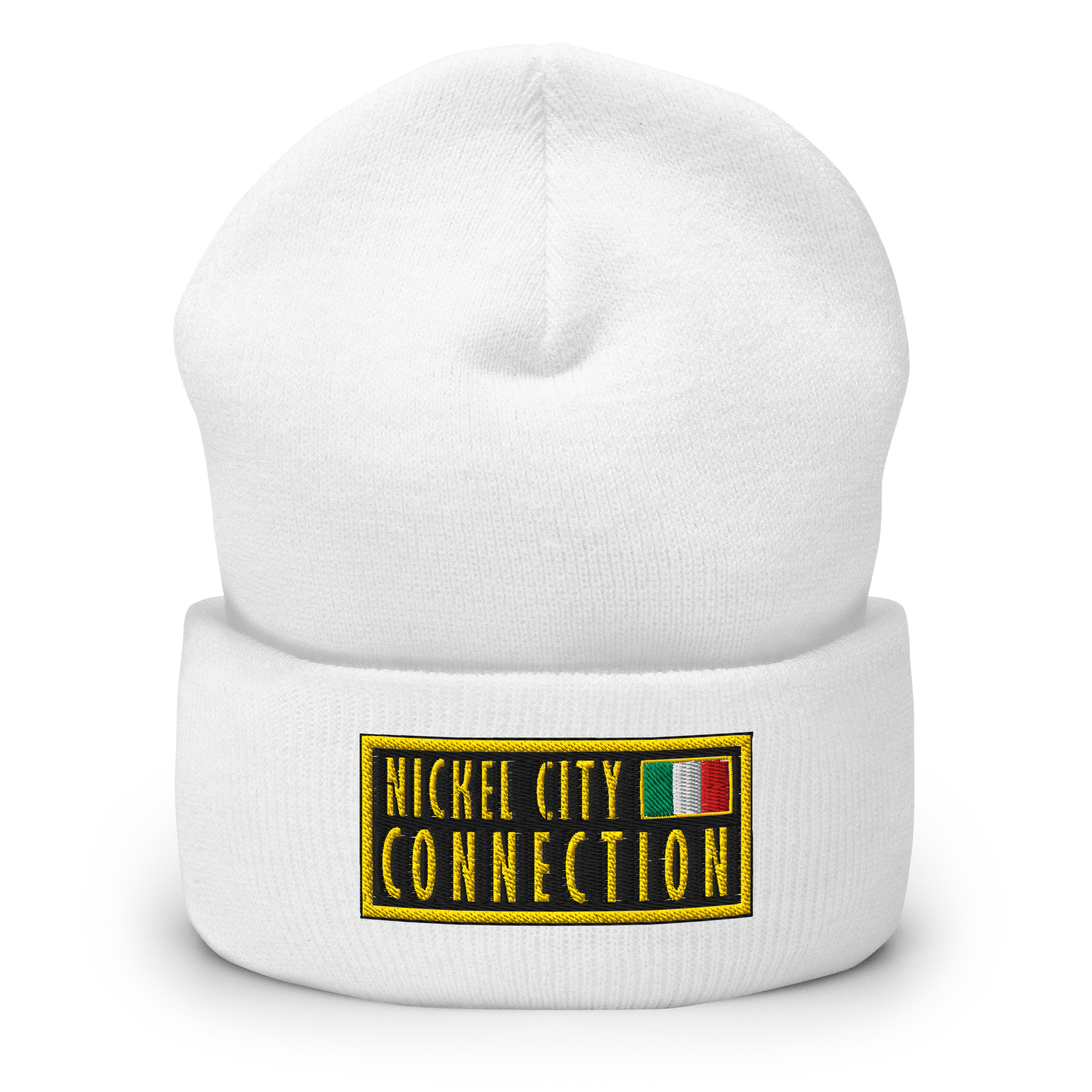 White beanie featuring An embroidered patch design featuring the text "NICKEL CITY CONNECTION" in bold, yellow capital letters on a black background. The text is enclosed in a yellow rectangular border. To the right of the text, there is a small embroidered Italian flag with green, white, and red vertical stripes, also bordered in yellow. 