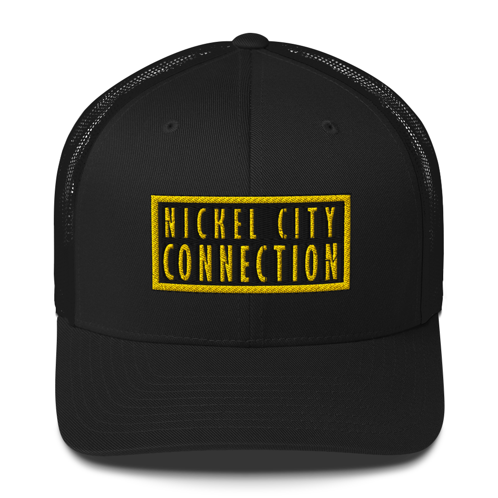 A Black trucker-style cap with a black and yellow embroidered patch on the front. The patch has bold yellow text reading 'NICKEL CITY CONNECTION' inside a black background with a yellow border.