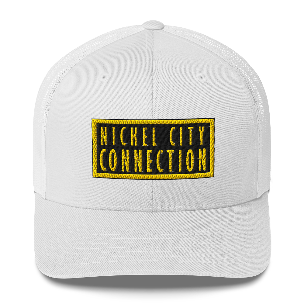 A white trucker-style cap with a black and yellow embroidered patch on the front. The patch has bold yellow text reading 'NICKEL CITY CONNECTION' inside a black background with a yellow border.