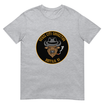 Grey t-shirt with a Logo featuring a stylized bison head wearing a fedora, smoking a cigar with visible smoke. The circular design includes bold gold text reading 'Nickel City Connection' at the top and 'Buffalo, NY' at the bottom, outlined in gold against a black background.