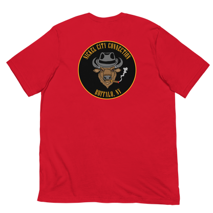 Red t-shirt with a Logo featuring a stylized bison head wearing a fedora, smoking a cigar with visible smoke. The circular design includes bold gold text reading 'Nickel City Connection' at the top and 'Buffalo, NY' at the bottom, outlined in gold against a black background.