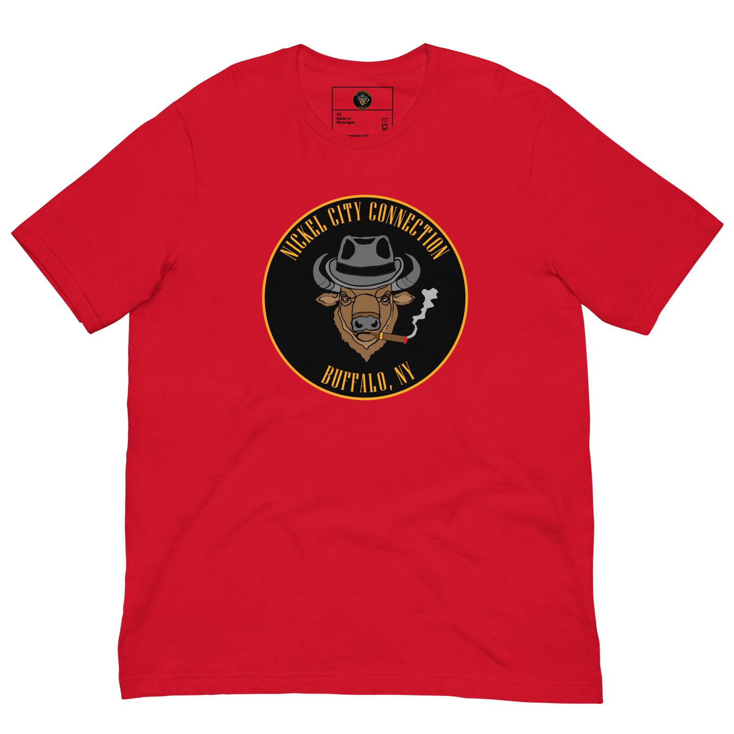 Red t-shirt with a Logo featuring a stylized bison head wearing a fedora, smoking a cigar with visible smoke. The circular design includes bold gold text reading 'Nickel City Connection' at the top and 'Buffalo, NY' at the bottom, outlined in gold against a black background.