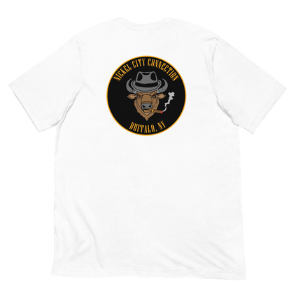 White t-shirt with a Logo featuring a stylized bison head wearing a fedora, smoking a cigar with visible smoke. The circular design includes bold gold text reading 'Nickel City Connection' at the top and 'Buffalo, NY' at the bottom, outlined in gold against a black background.