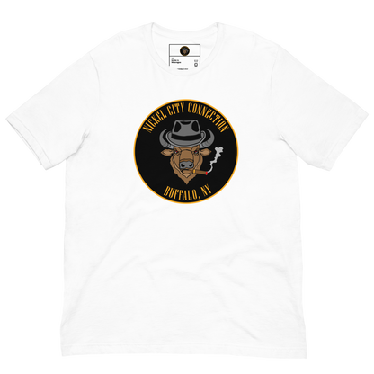 White t-shirt with a Logo featuring a stylized bison head wearing a fedora, smoking a cigar with visible smoke. The circular design includes bold gold text reading 'Nickel City Connection' at the top and 'Buffalo, NY' at the bottom, outlined in gold against a black background.